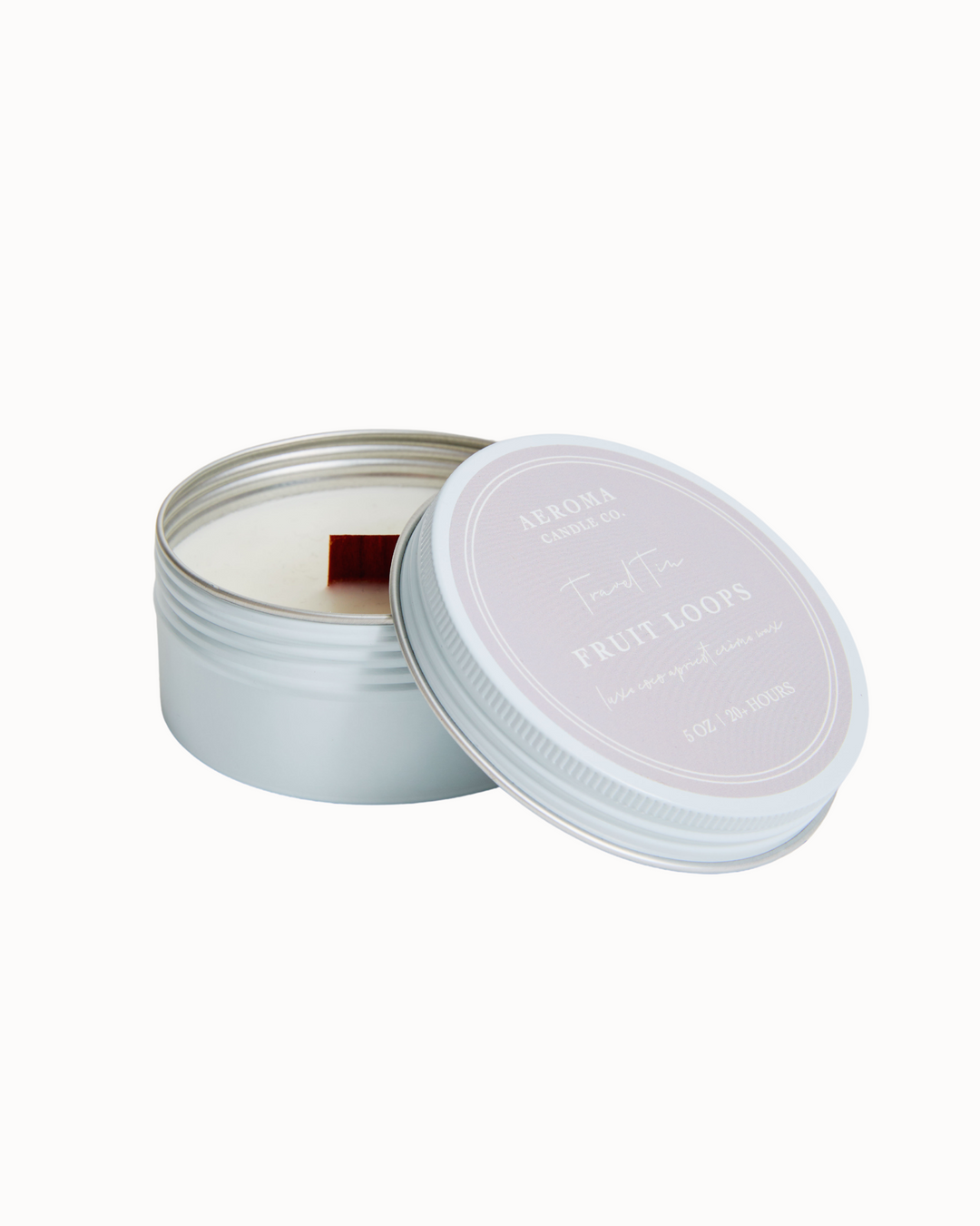 A 5 oz travel tin candle by Aeroma Candle Co. in the Fruit Loops scent.