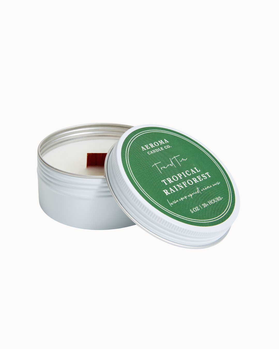 A 5 oz travel tin by Aeroma Candle Co. in the Tropical Rainforest scent.