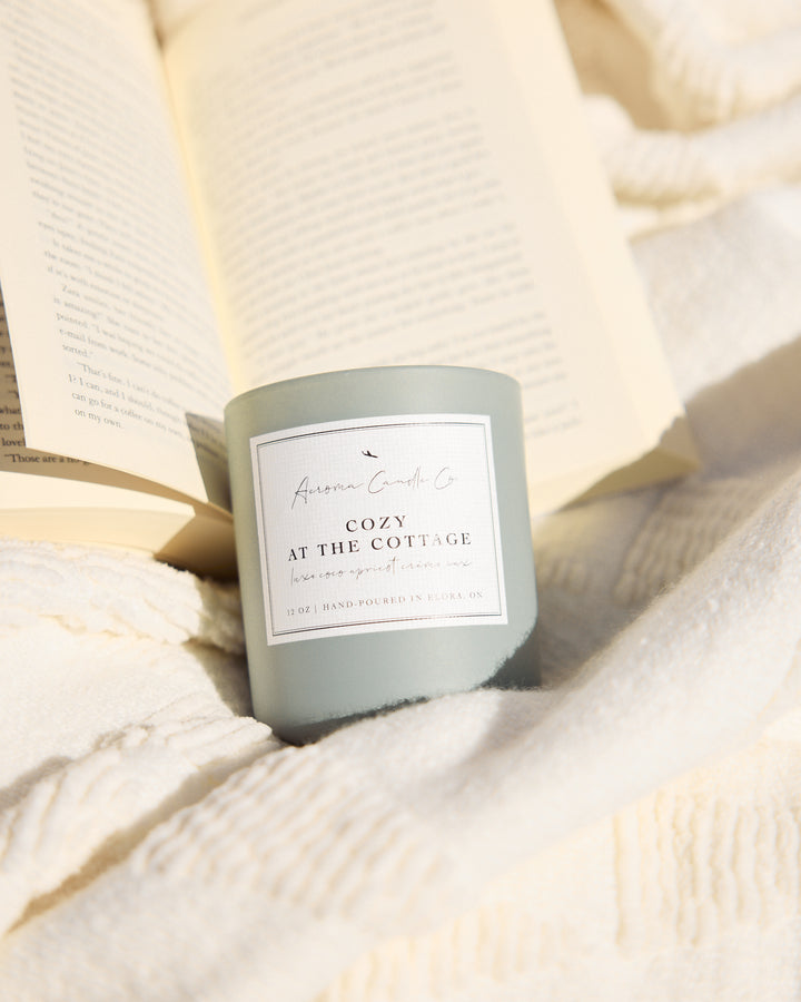 Candle labeled &