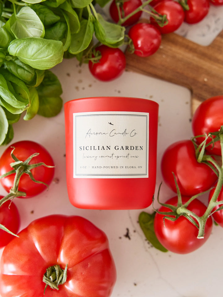 Red candle labeled &