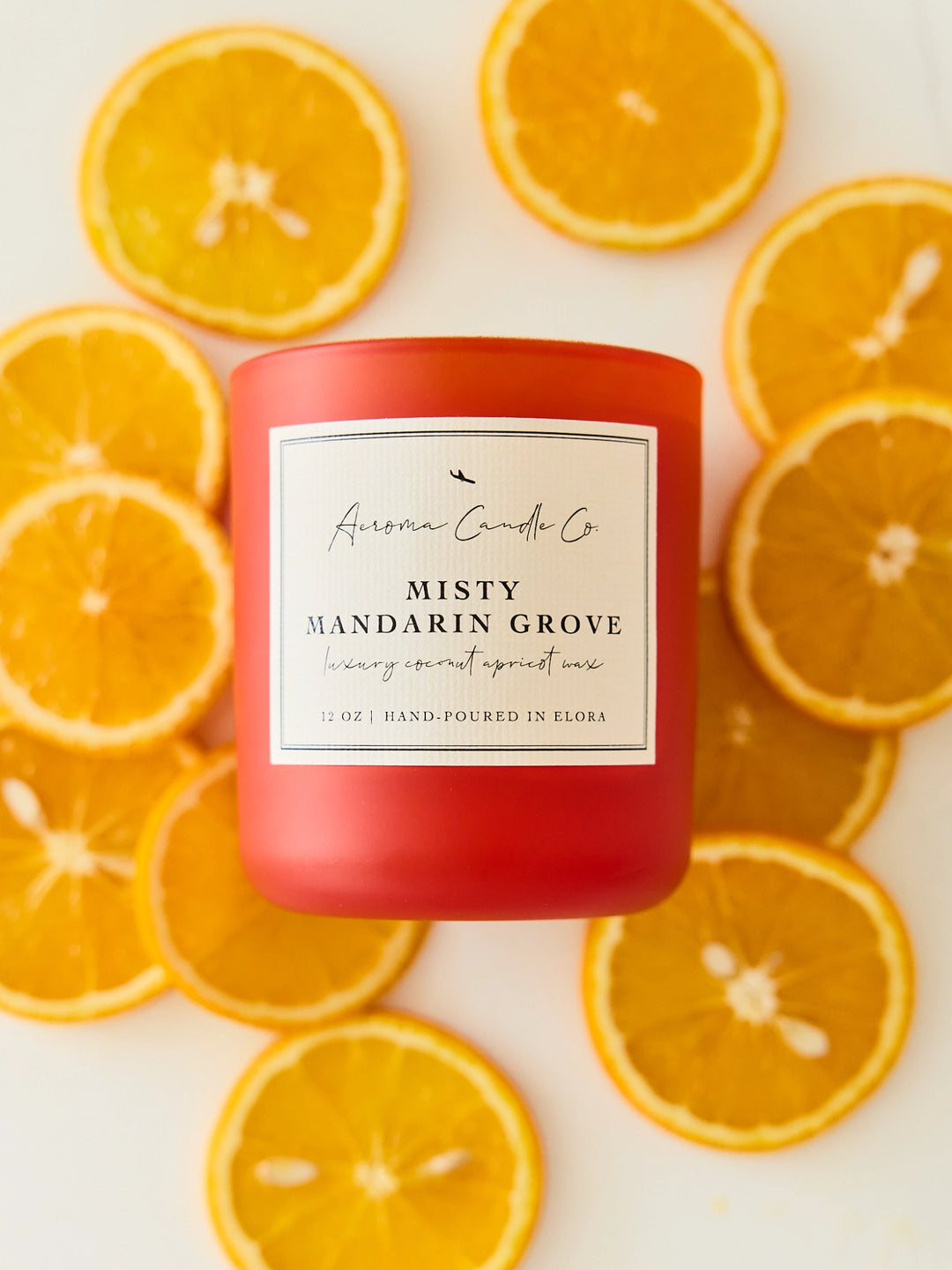Red candle labeled &