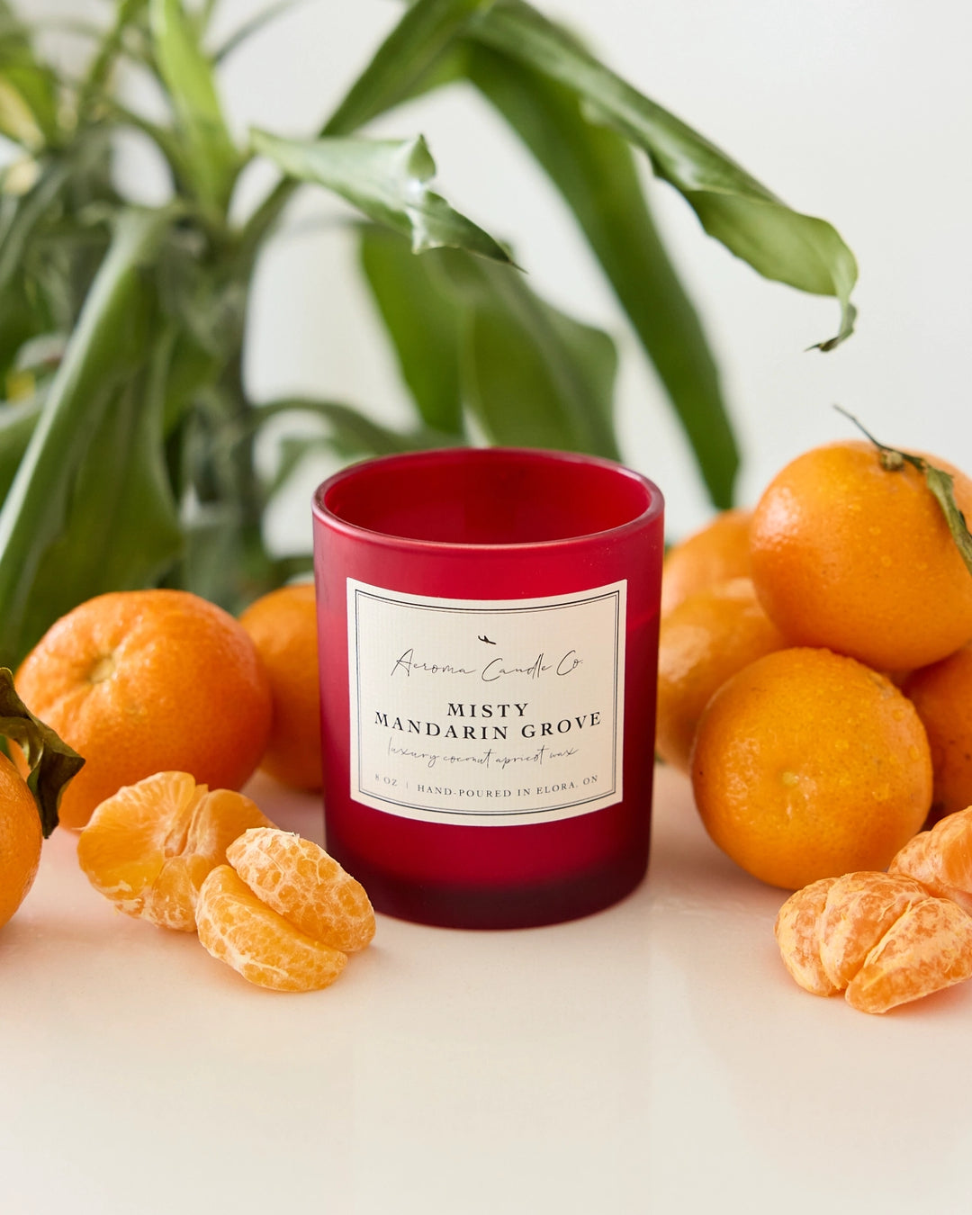 Red candle labeled &